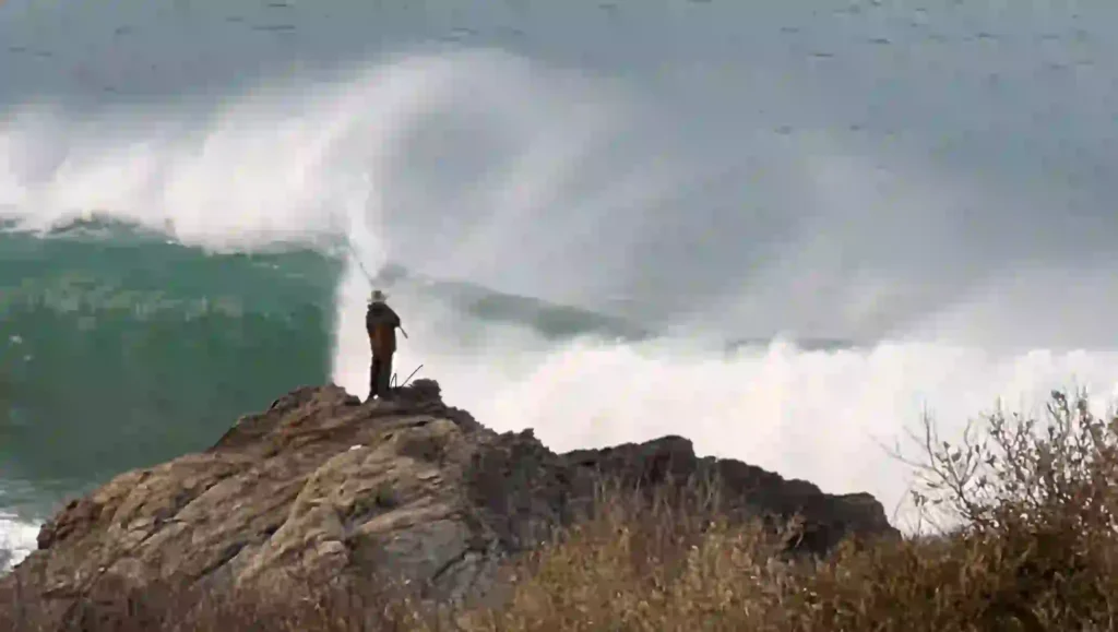 The sight of a solitary fisherman perched precariously on a towering boulder amid the crashing waves evoked a mixture of awe and apprehension. 


Fisherman-at-high-tide